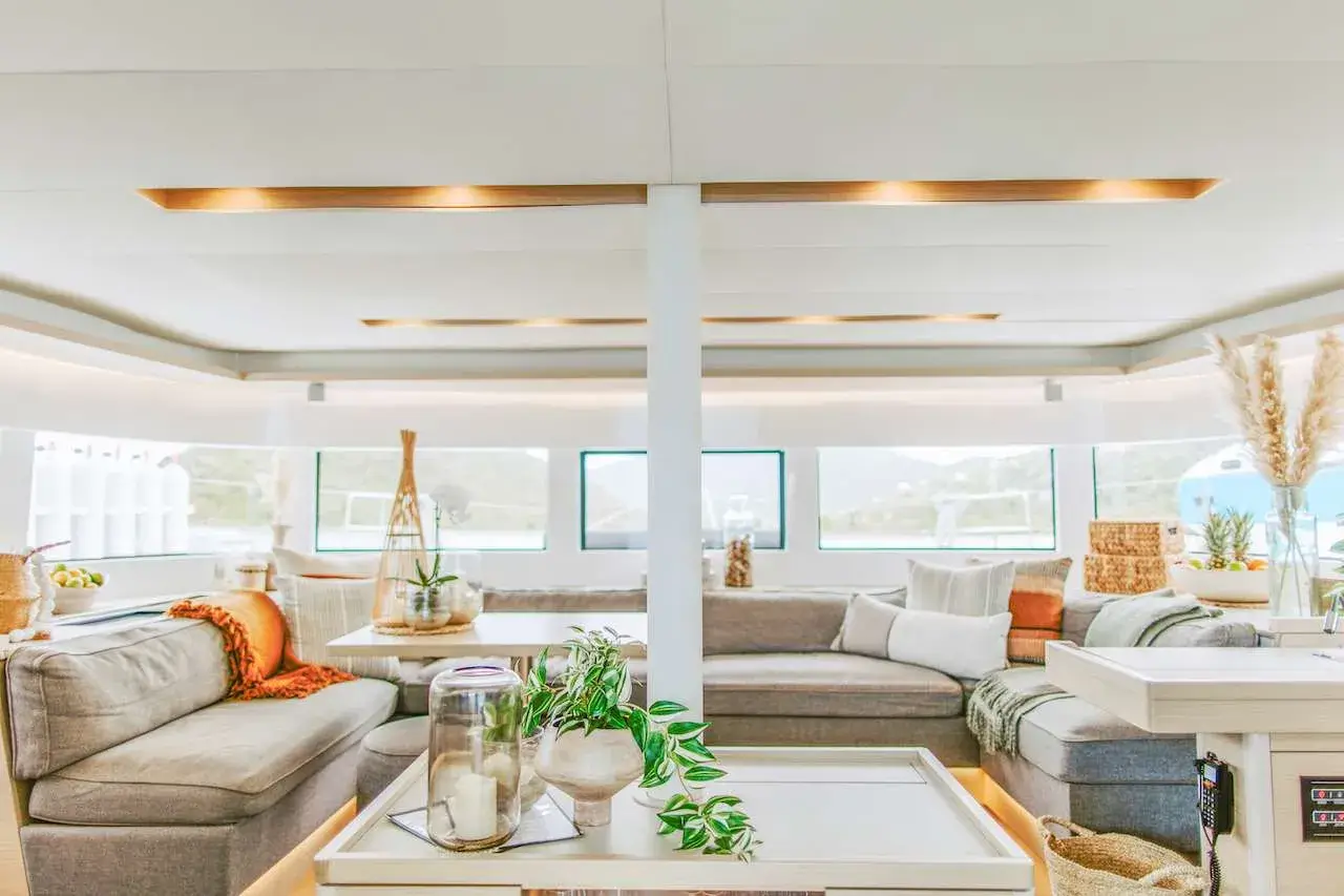 Bright, airy saloon inside a luxury crewed catamaran